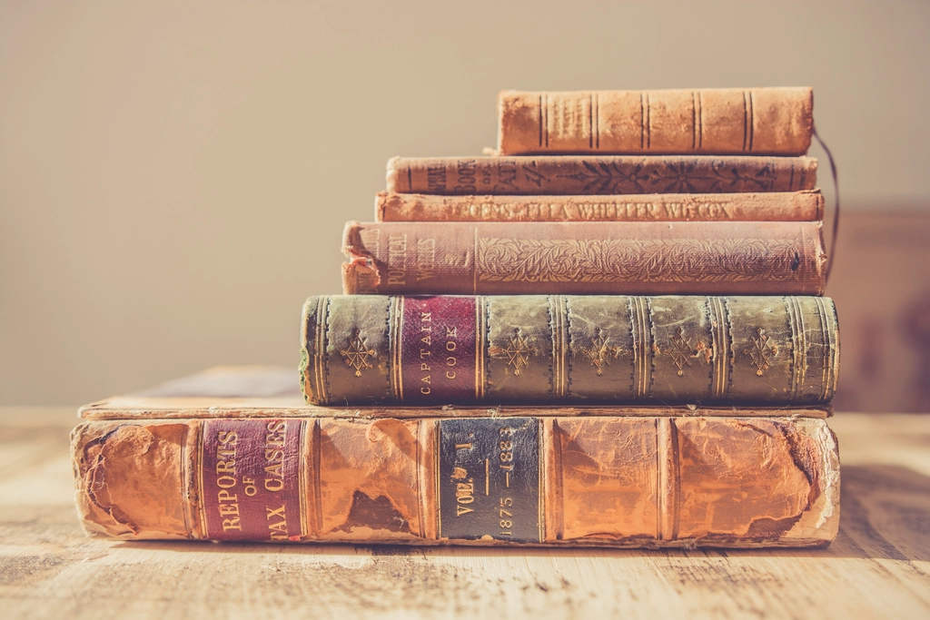 Pile old books table